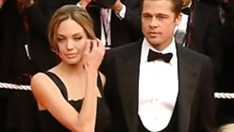 Boy crushed under crowd, Pitt, Jolie to the rescue