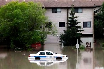 Floods kill three in Calgary, 75,000 rendered homeless