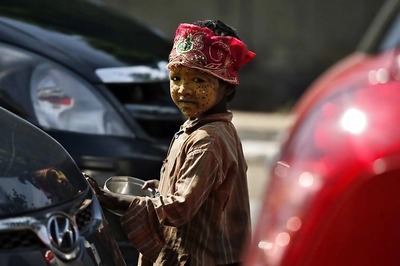 Traffickers in India Force 300,000 Children to Beg on Streets