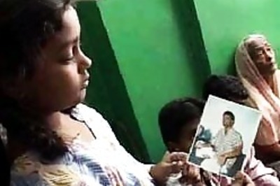 Pilgrims' families wait at home