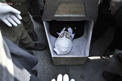 'He went in the uniform, came back in a coffin,' wails a Pakistan school attack victim's father