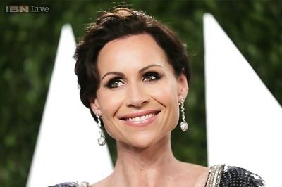 Minnie Driver hits back at critics by posting nude photos on Twitter