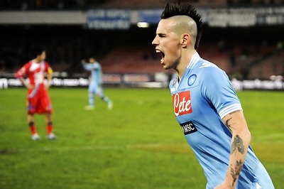 Napoli beat Catania 2-0, move level with Juve