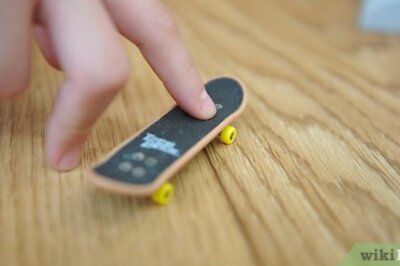 How to Ollie on a Tech Deck Using Three Fingers