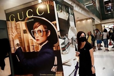 Gucci owner Kering says outlook unclear as virus hammers sales