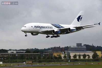 Malaysia Airlines denies crash report, says plane still missing