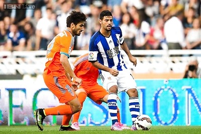 Valencia draw at Sociedad, slip to second in Spain