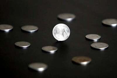 Rupee gains, trades around 60.40 as current account deficit narrows