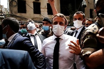 Macron promises angry Beirut crowds aid won't go to 