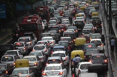 Heavy showers lash Delhi, traffic hit