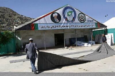 Rocket attack as Karzai launches peace plan