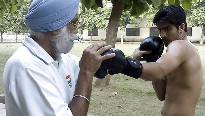 Olympics setback has motivated boxers: Sandhu