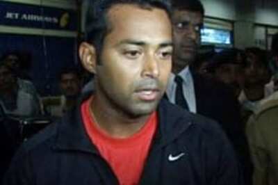 Paes advances in mixed doubles