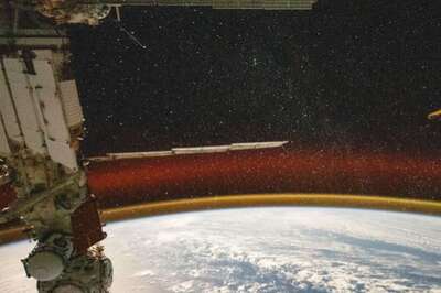 ISS Shares 'Out Of The World' Photo Featuring Earth Against Starry Backdrop