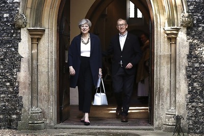 Tottering Theresa May Names New UK Cabinet as Critics Circle