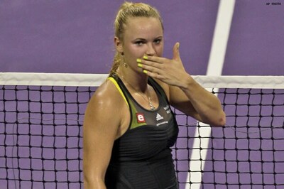 Wozniacki, Zvonareva victorious in Doha