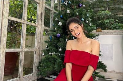 Ananya Panday Soaks in Christmas Spirit in Red Off-shoulder Dress