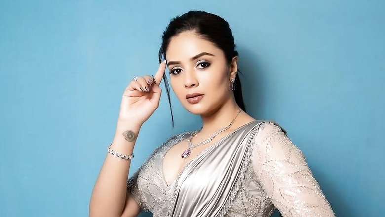 Actress Sreemukhi Slays Traditional Look In Silver Satin Saree