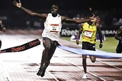 Jamaica's Usain Bolt breaks 100m world record