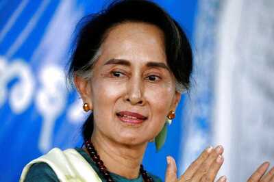 Myanmar's Suu Kyi Defends Jailing of Two Reuters Journalists