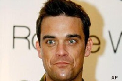 Robbie Williams to sing with Asha