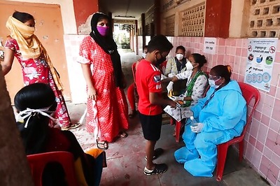 Asia Today: India has record high of 69,000 more infections