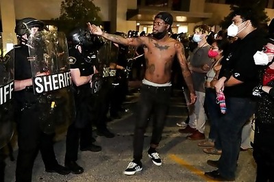 Police Shoot Black Man In The Back In Wisconsin City, Sparking Unrest