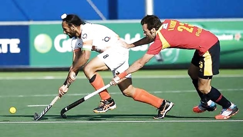 Hockey World Cup 2014: India draw with Spain, earn 1st point