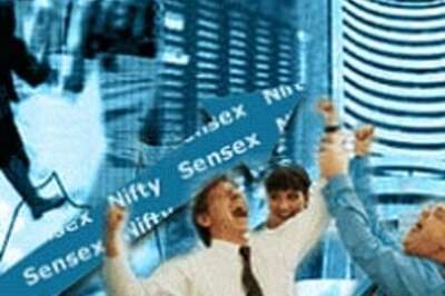 Sensex peaks, closes at 13,033.04