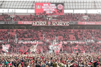 WATCH: Bayer 04 Leverkusen Fans Revel In Celebrations On The Pitch After Bundesliga Triumph