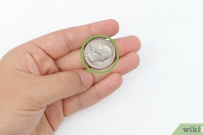 How to Roll a Coin on Your Knuckles