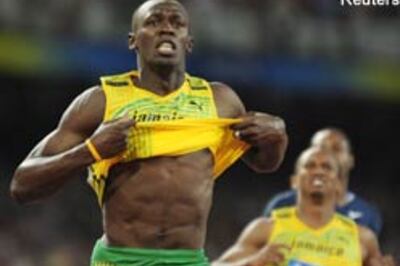Usain Bolt-s to gold, new world record in 100m