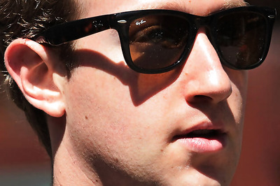 Facebook's Zuckerberg won't sell shares for a year