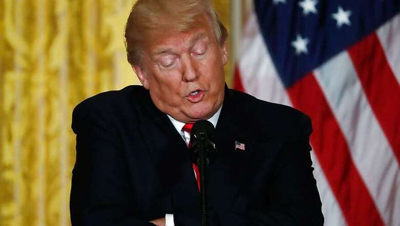 Trump Jokes on Infamous Hairstyle, Says 'I Try Like Hell to Hide Bald Spot'