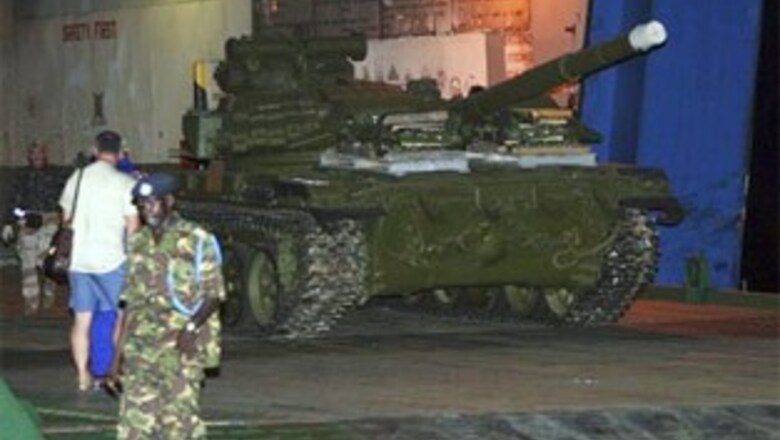 Freed Faina unloads tanks in Kenya, crew return home
