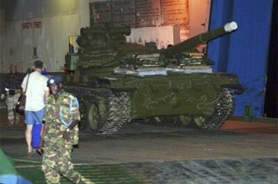 Freed Faina unloads tanks in Kenya, crew return home