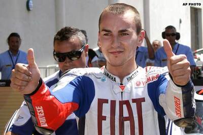 Lorenzo beats Rossi to win French GP