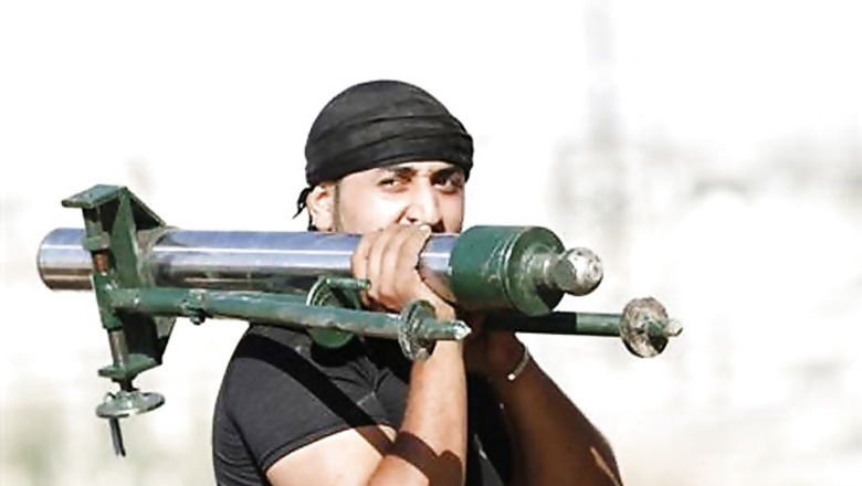 Syrian jets hit rebels awaiting promised US weapons