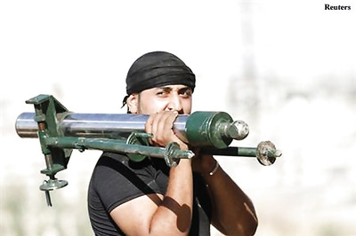 Syrian jets hit rebels awaiting promised US weapons