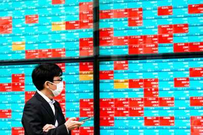 Asian Shares Subdued as S&P Slips and Covid-19 Virus Surges in Europe, US
