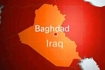 Shiite fighters make show of force in Baghdad