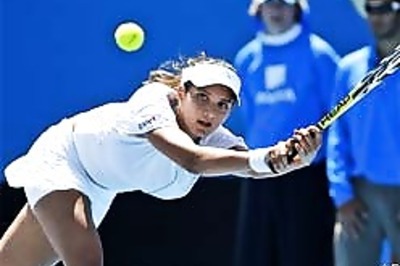 Bhupati adavances, Sania crashes out