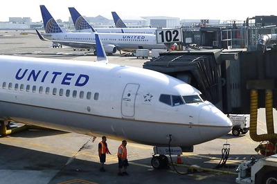 United Airlines Staff Drags Passenger From Overbooked Flight