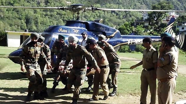 Live: 500 roads, 175 bridges washed away; thousands still stuck, says CM