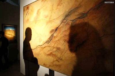 Gaddafi's artist son shows off paintings