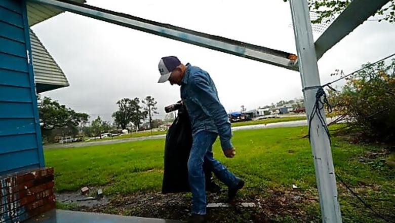 The Latest: Delta Downgraded But Still Causing Damage