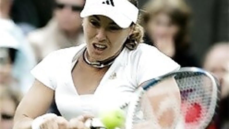 Rain stops Hingis at Wimbledon
