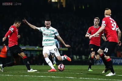 Manchester United and City through in FA Cup, QPR stunned