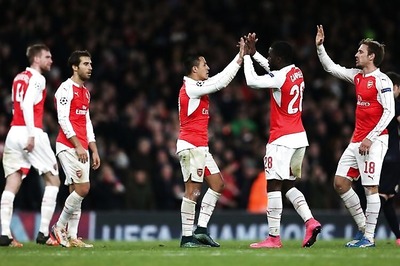 Sanchez double helps keep Arsenal's hopes alive in Champions League