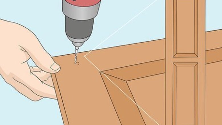 How to Hang Wood Shutters on Brick